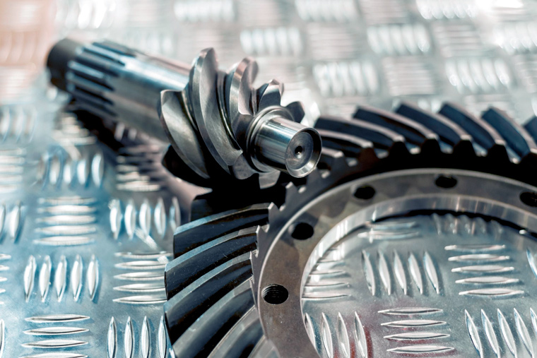 Helical bevel gear set designed for transmitting torque between intersecting shafts in industrial gearbox applications.
