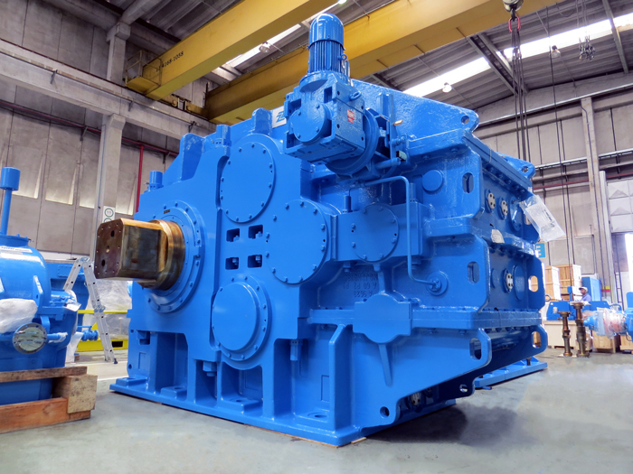 Large industrial gear reducer used in manufacturing processes to ensure controlled speed and efficient power transmission.