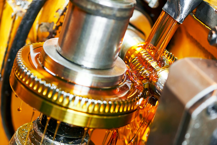Lubrication system integrated into an industrial gearbox, highlighting the role of high-quality lubricants in equipment reliability and performance.