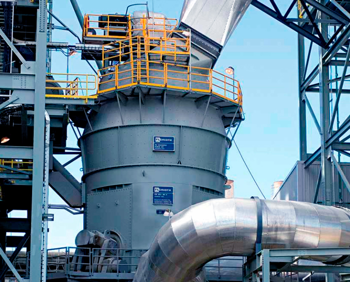 Industrial roller mill used for grinding and processing materials in heavy-duty applications.